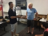 Club Prez Parry Gryllis presenting Pat Mullins with Life Membership. Pat has held various positions for the club over his close to 30 year membership with the Dolphins.